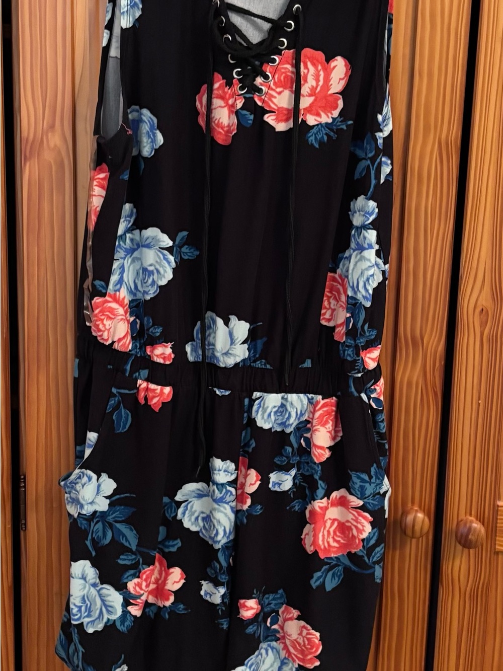 No Boundaries Black Floral Lace-Up Romper with Red and Light Blue Blooms